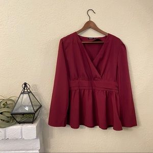 Peplum long sleeve burgundy blouse